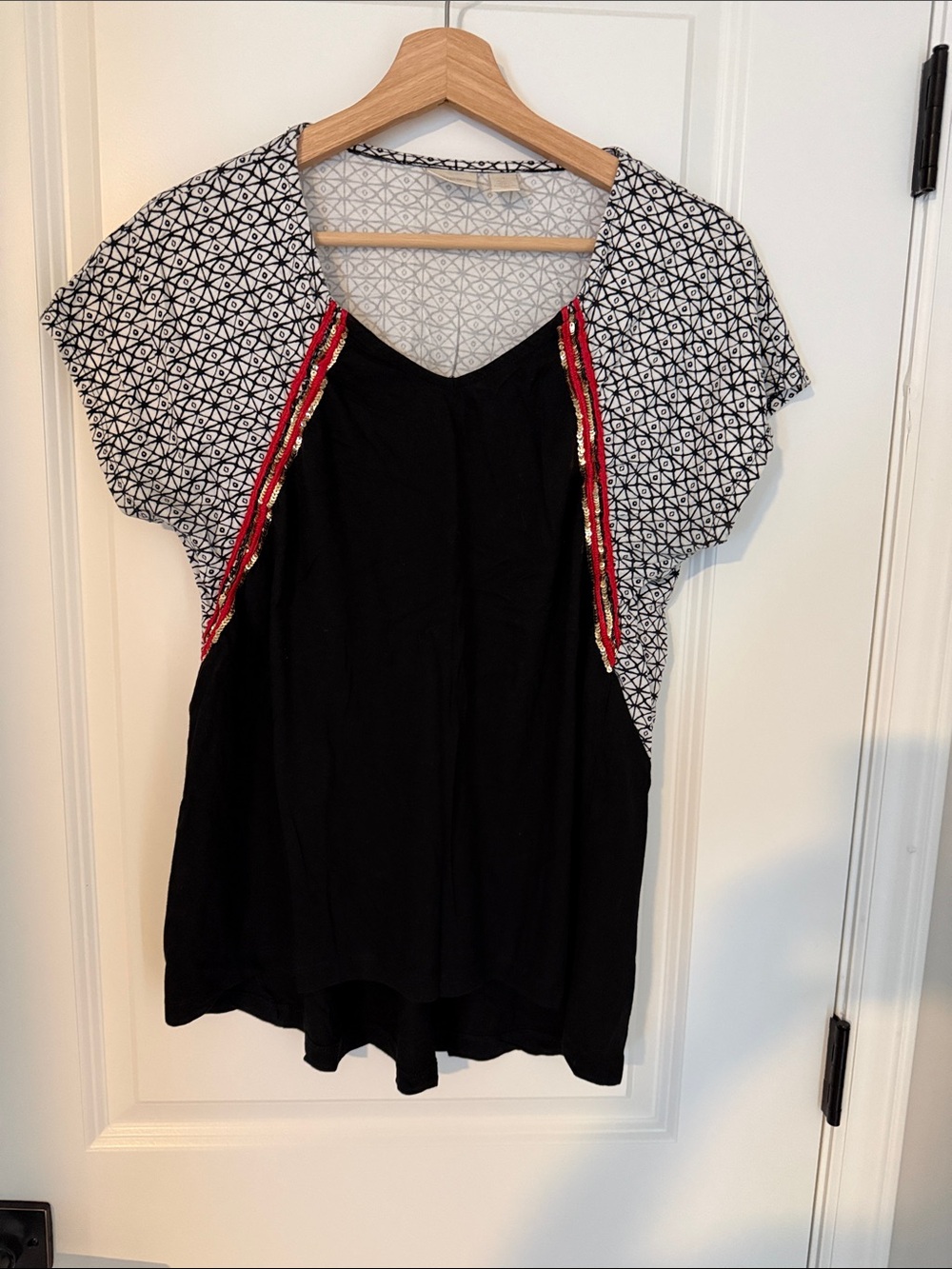 Chico's Black V-Neck Top with White Geometric Sleeves and Red Trim